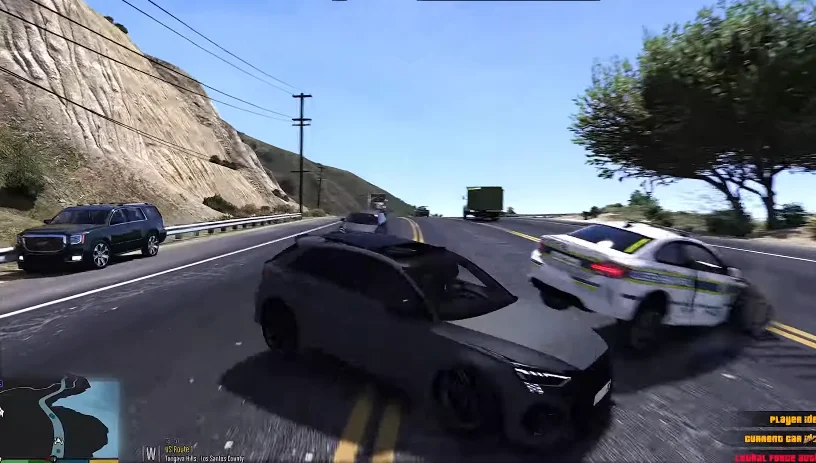 A black sports car collides with a police car on a winding road, surrounded by hills and trees. GTA Mzansi APK download kasi vibes.